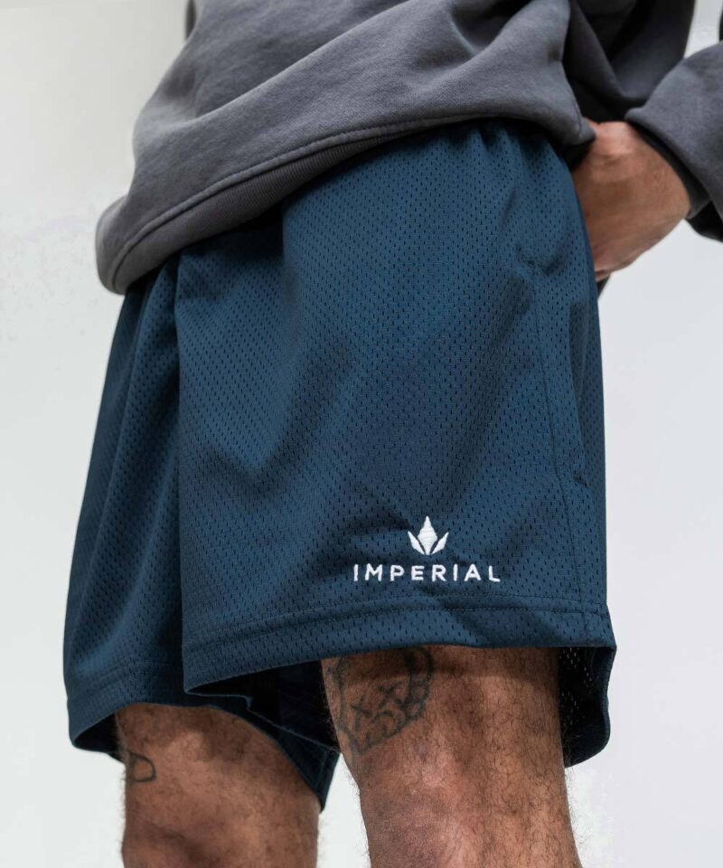 Imperial Merch essentials signature shorts in navy blue worn by model