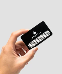 Imperial Extraction thca flower grinder card being held by a hand